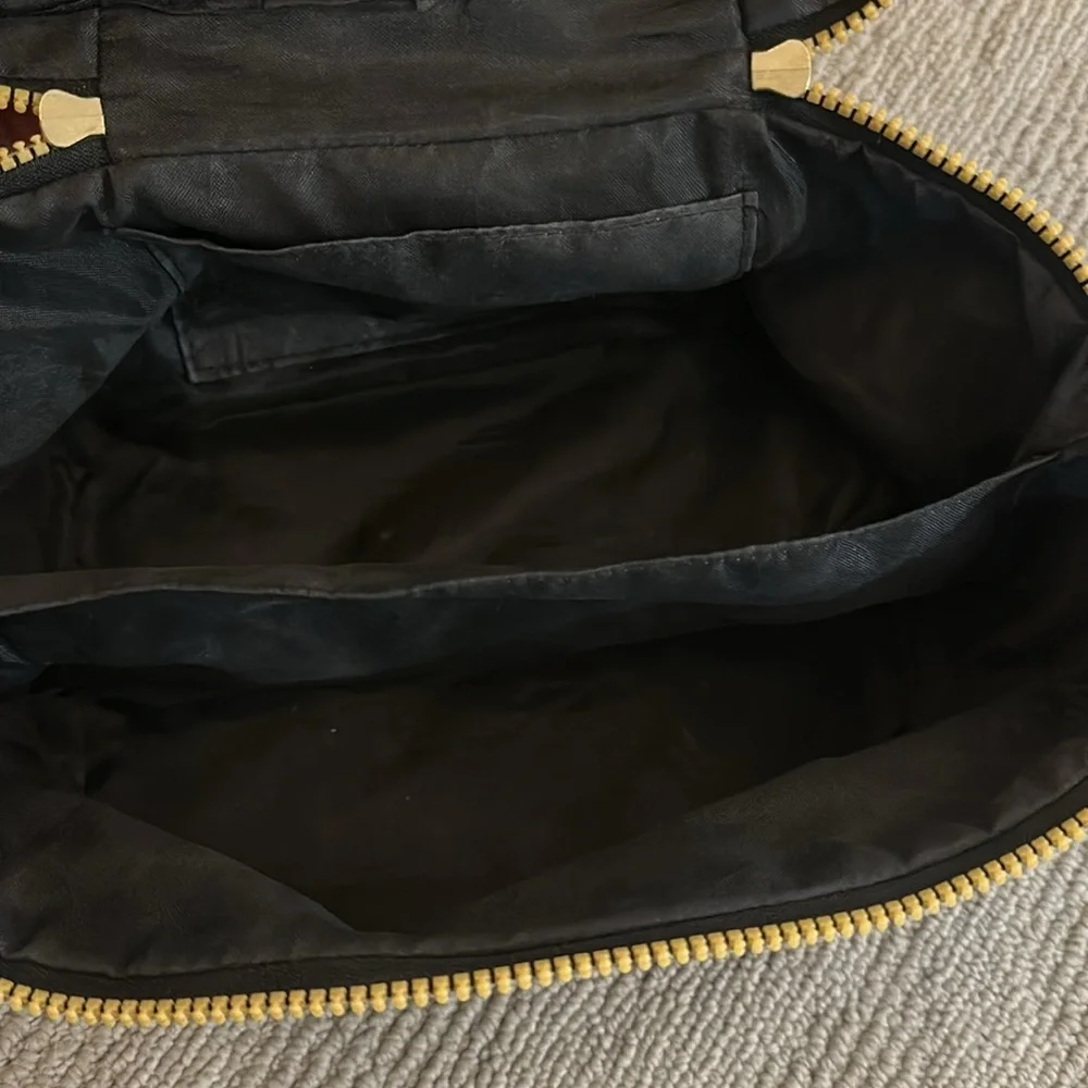 Nicole Miller multicolor cosmetic bag​